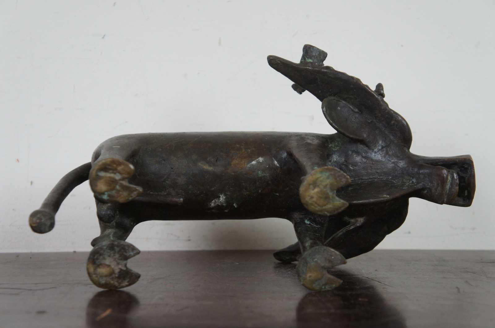 Antique bronze African store water buffalo and birds figurine